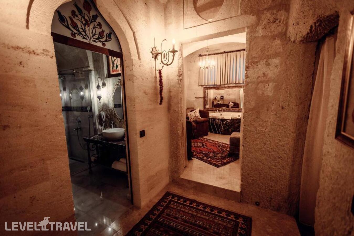 фотографии номера Люкс роскошный отеля Tafoni Houses Cave Hotel в Турция(Ортахисар) - фото №18