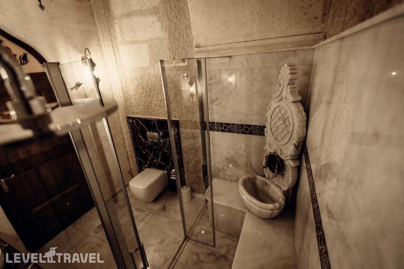 фотографии номера Люкс роскошный отеля Tafoni Houses Cave Hotel в Турция(Ортахисар) - фото №2