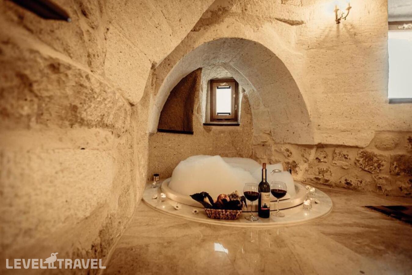 фотографии номера Люкс роскошный отеля Tafoni Houses Cave Hotel в Турция(Ортахисар) - фото №6