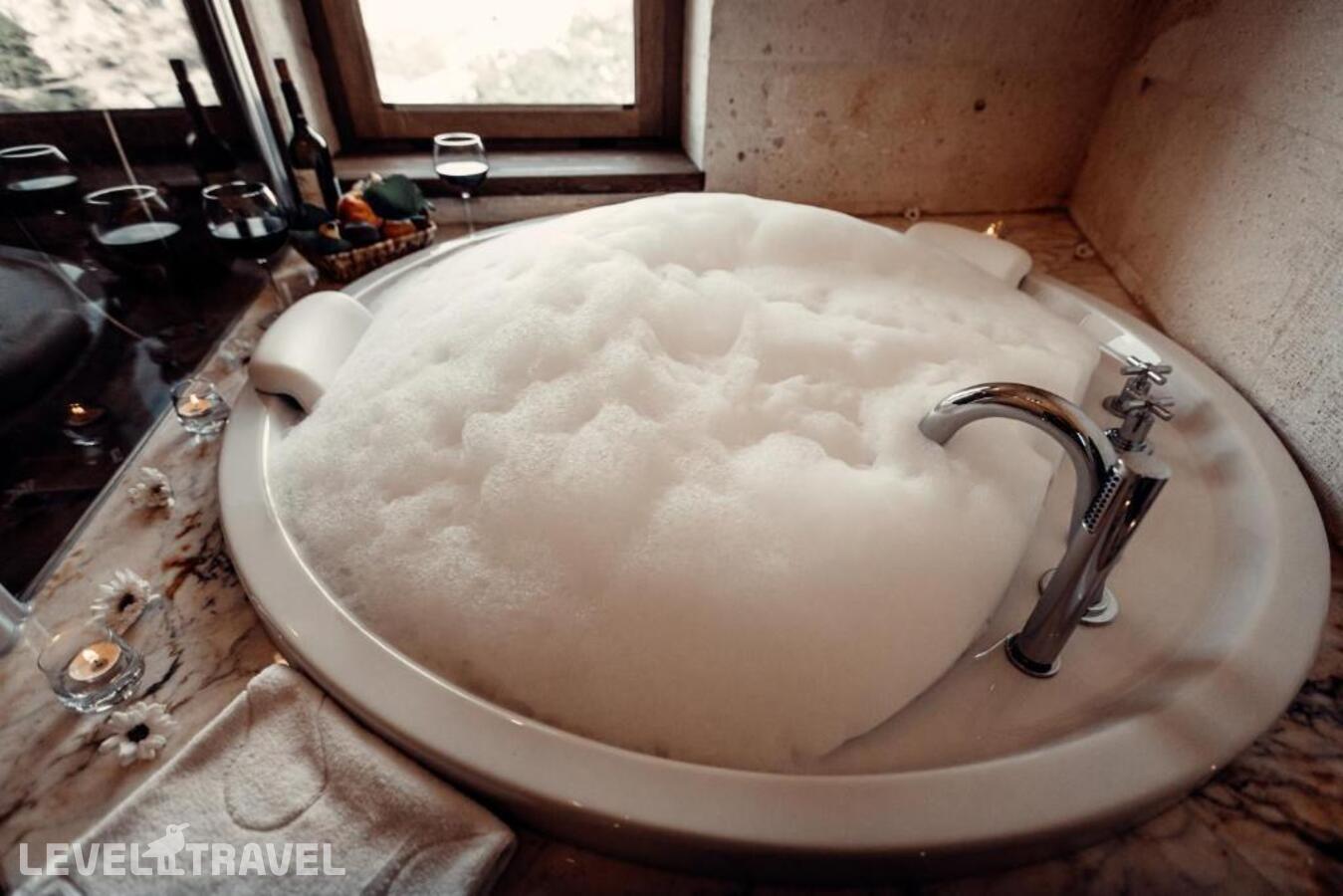 фотографии номера Люкс роскошный отеля Tafoni Houses Cave Hotel в Турция(Ортахисар) - фото №12