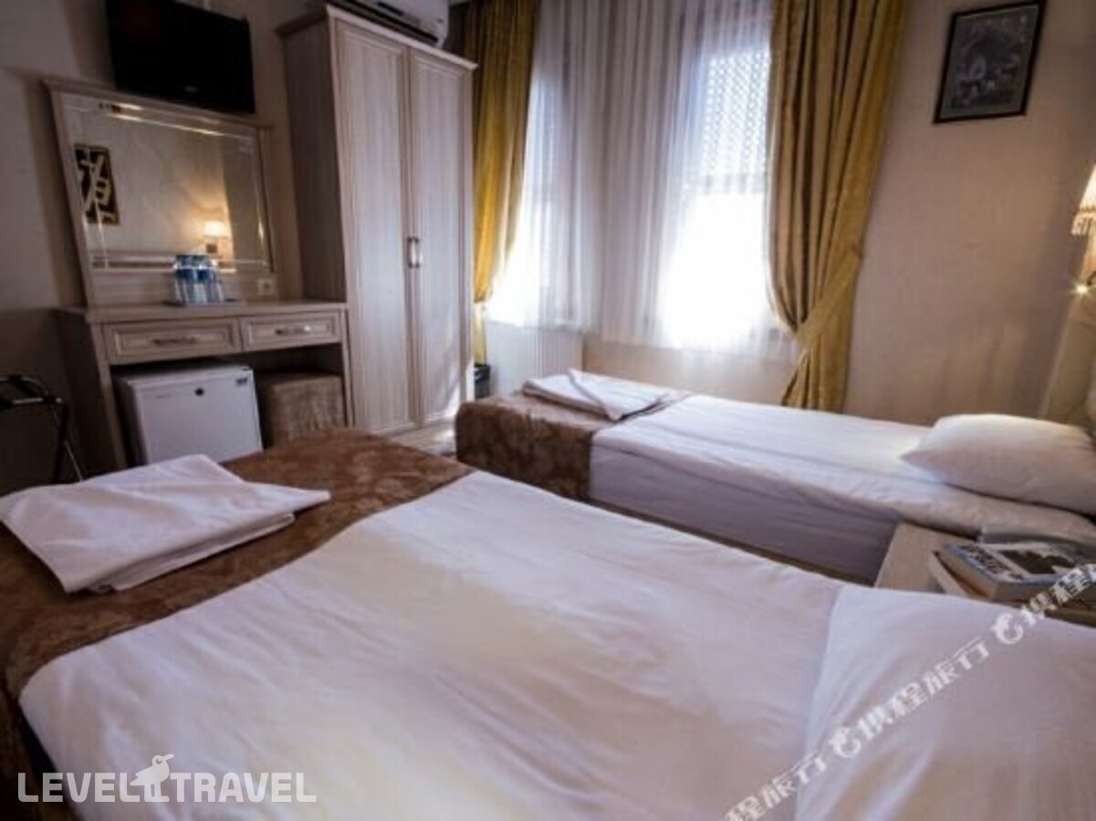 фотографии номера Трехместный номер отеля Tashkonak Hotel Istanbul в Турция(Фатих) - фото №13