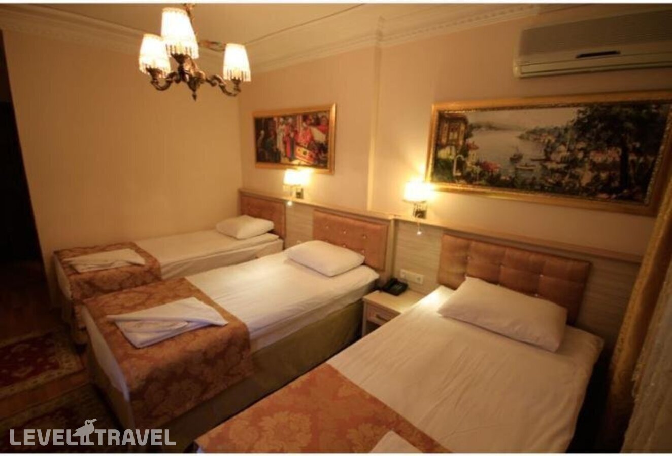 фотографии номера Трехместный номер отеля Tashkonak Hotel Istanbul в Турция(Фатих) - фото №2