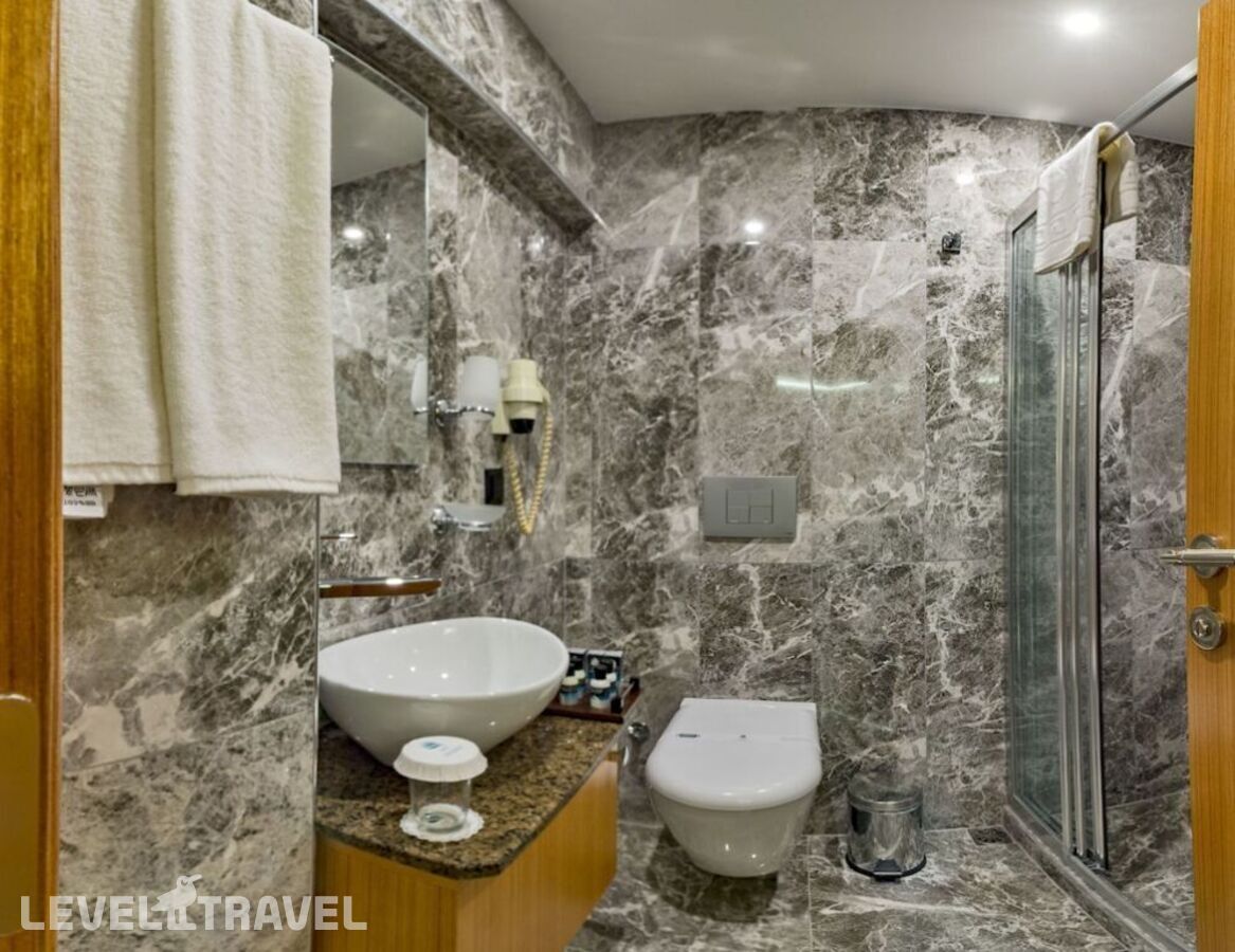 фотографии номера Одноместный номер отеля Bergama Hotel в Турция(Фатих) - фото №1