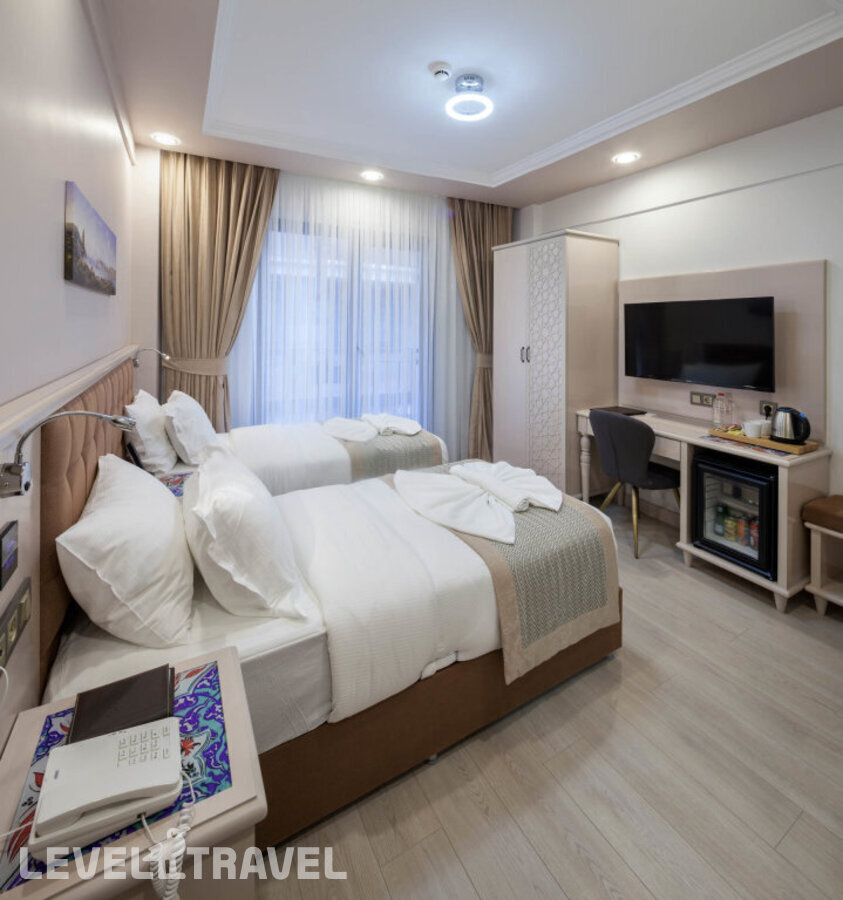 фотографии номера Стандартный номер отеля Obahan Hotel в Турция(Фатих) - фото №4