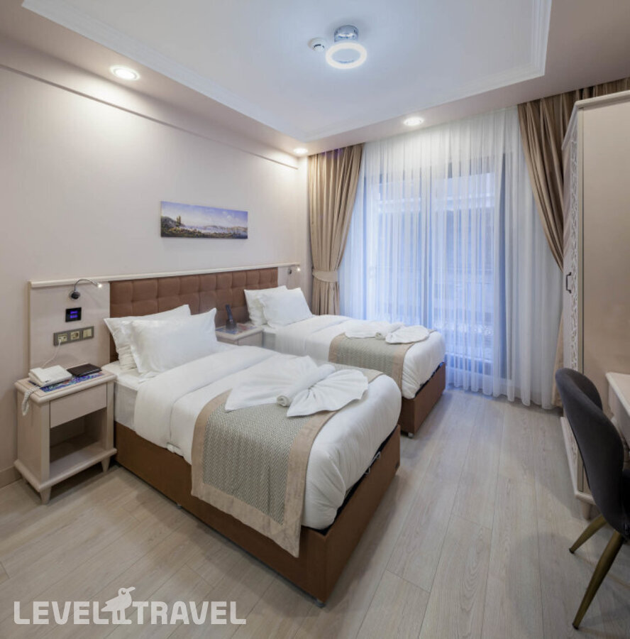 фотографии номера Стандартный номер отеля Obahan Hotel в Турция(Фатих) - фото №3