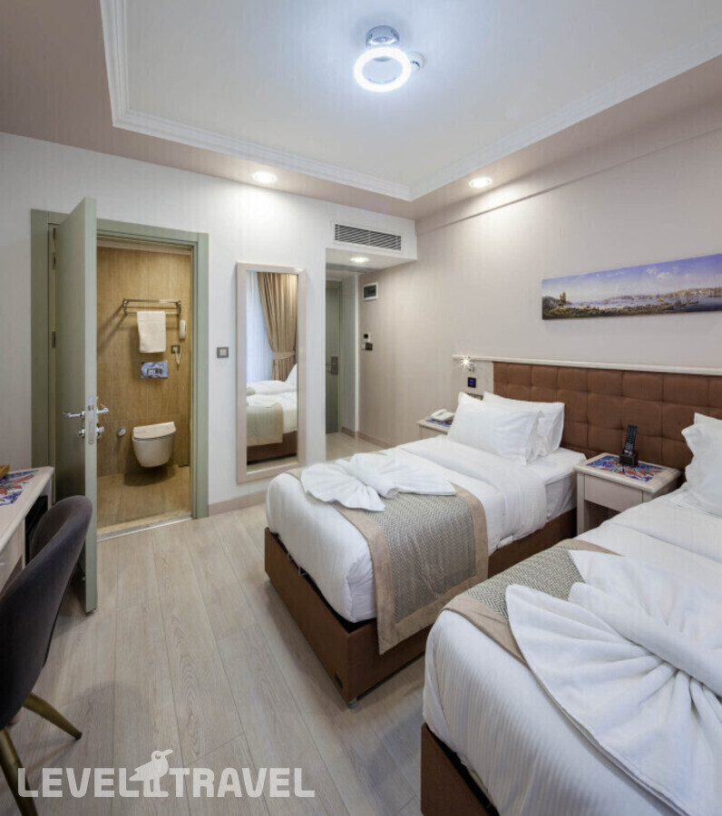 фотографии номера Трехместный номер отеля Obahan Hotel в Турция(Фатих) - фото №4