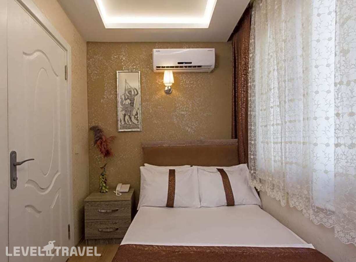 фотографии номера Экономичный номер отеля Carvan Hotel в Турция(Фатих) - фото №1