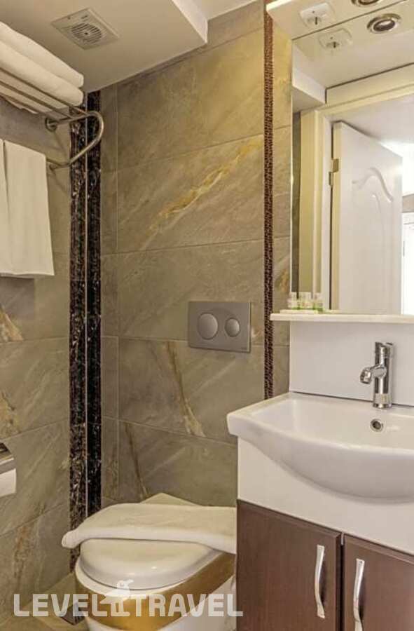 фотографии номера Экономичный номер отеля Carvan Hotel в Турция(Фатих) - фото №7