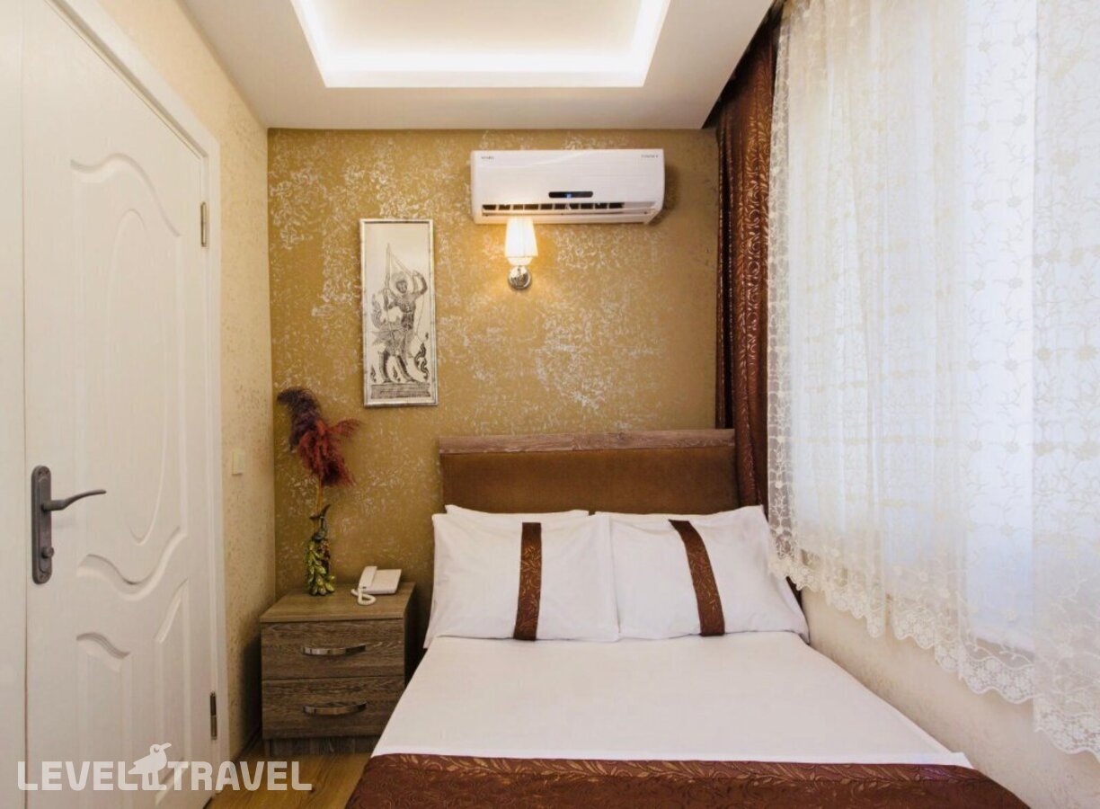 фотографии номера Трехместный номер отеля Carvan Hotel в Турция(Фатих) - фото №1