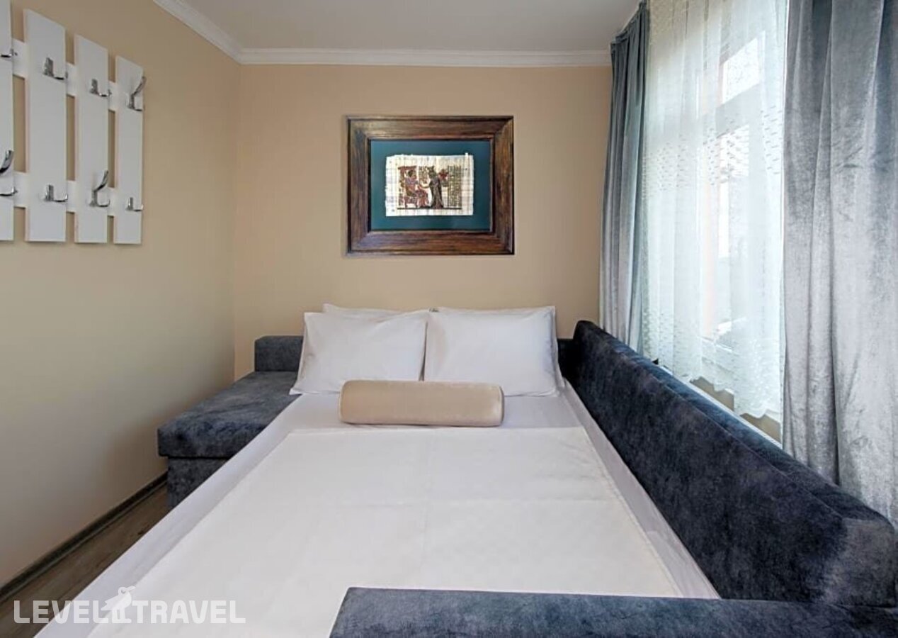 фотографии номера Четырехместный номер отеля Carvan Hotel в Турция(Фатих) - фото №9
