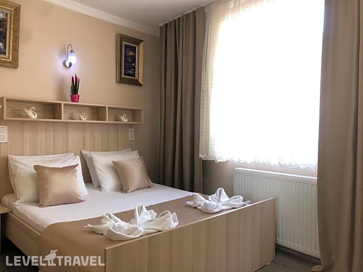 фотографии номера Четырехместный номер отеля Carvan Hotel в Турция(Фатих) - фото №5