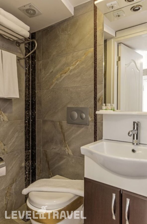 фотографии номера Апартаменты семейные отеля Carvan Hotel в Турция(Фатих) - фото №21