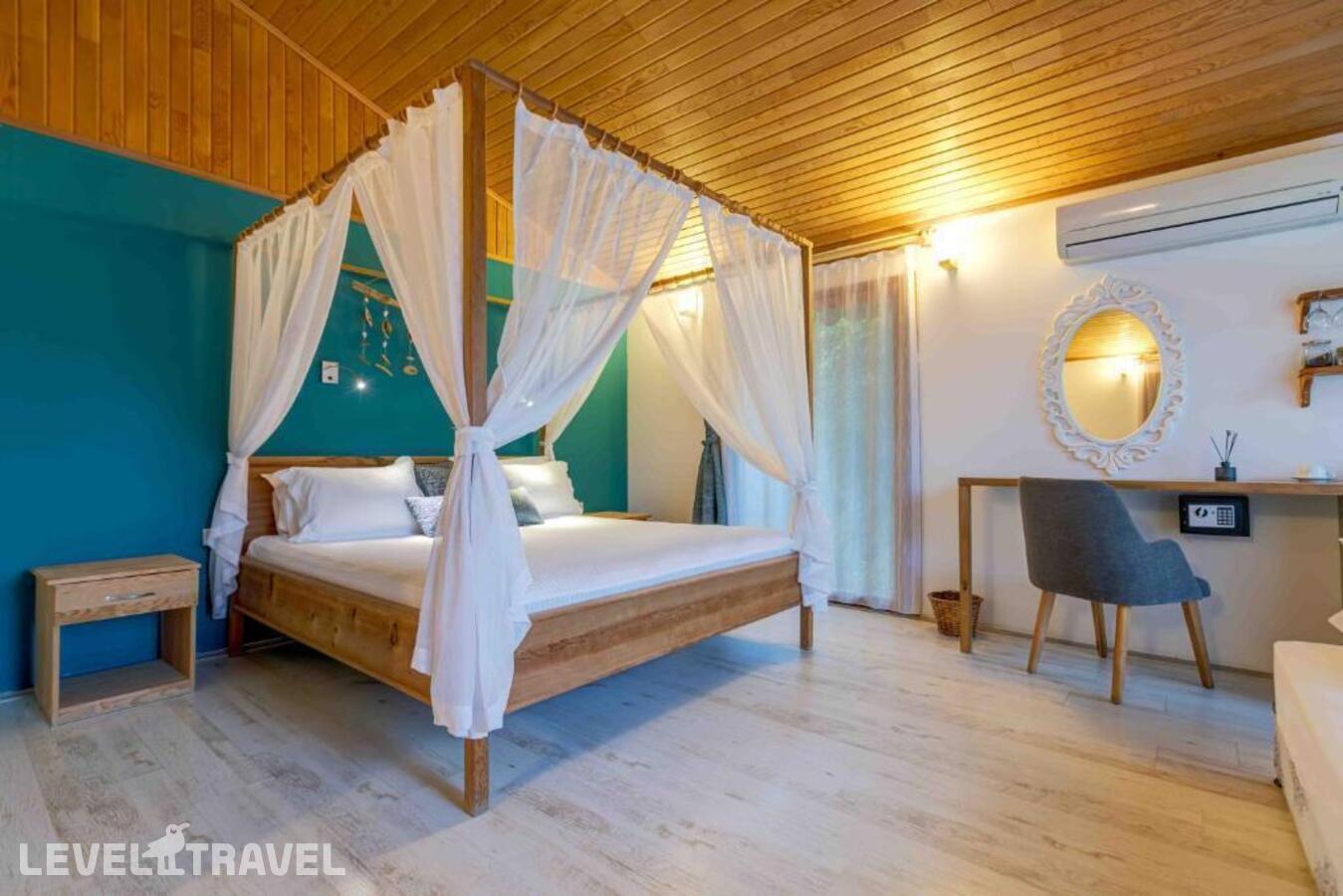 фотографии номера Бунгало отеля Etenna Beach Bungalows в Турция(Чиралы) - фото №8