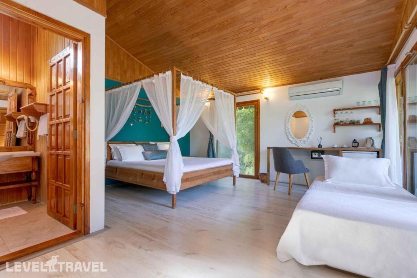 фотографии номера Бунгало отеля Etenna Beach Bungalows в Турция(Чиралы) - фото №3