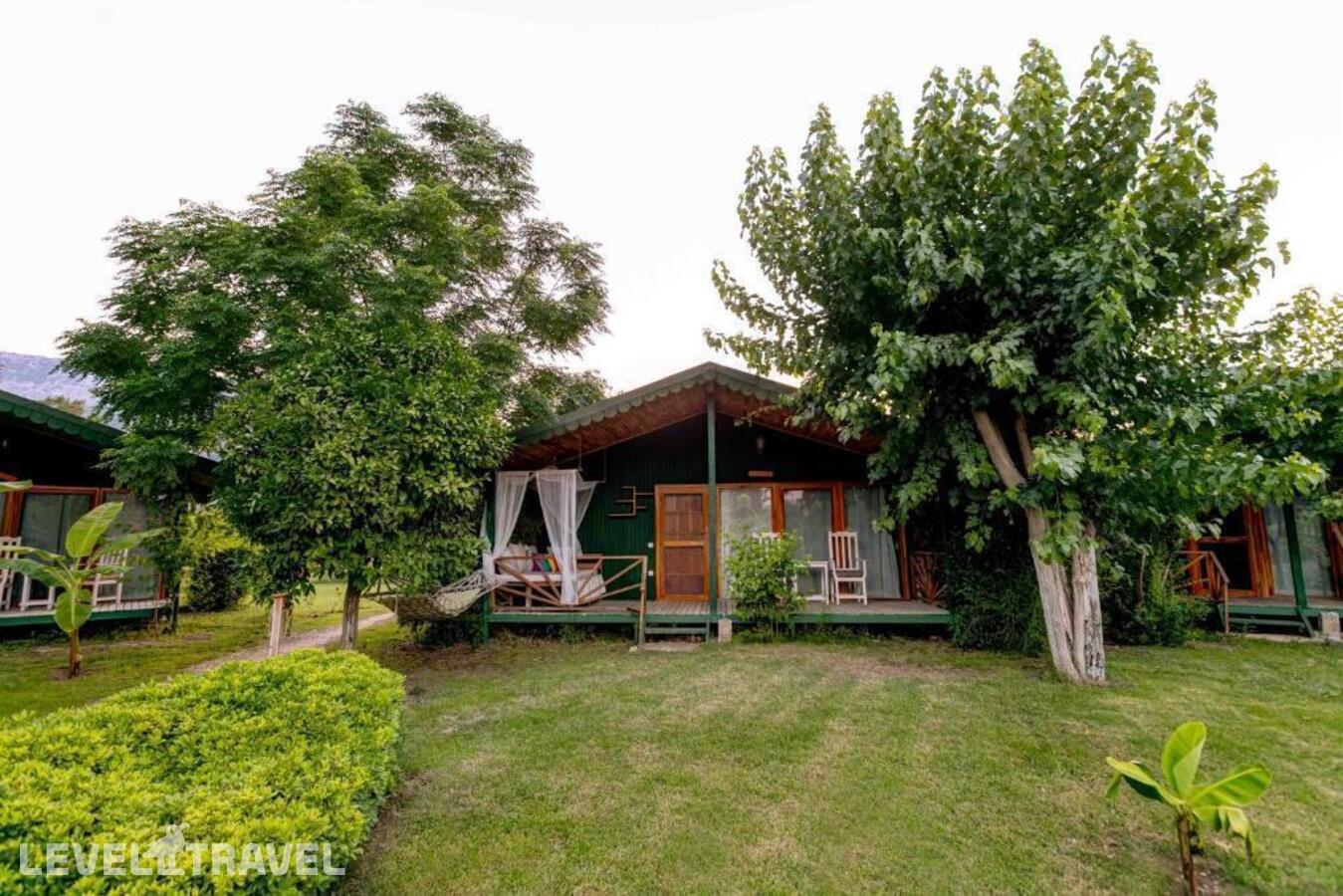 фотографии номера Бунгало отеля Etenna Beach Bungalows в Турция(Чиралы) - фото №1