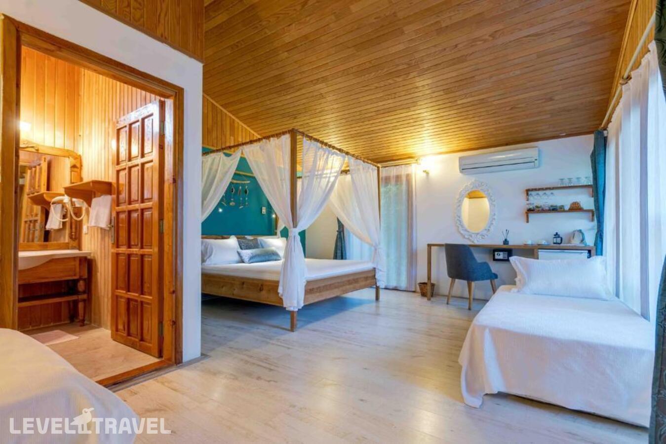 фотографии номера Бунгало отеля Etenna Beach Bungalows в Турция(Чиралы) - фото №5