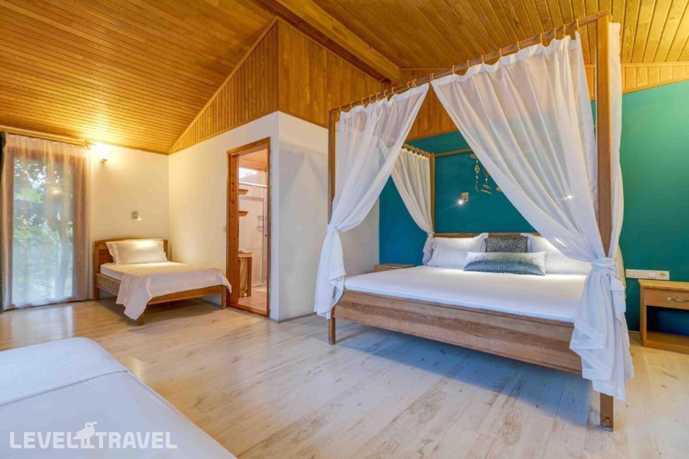 фотографии номера Бунгало отеля Etenna Beach Bungalows в Турция(Чиралы) - фото №6