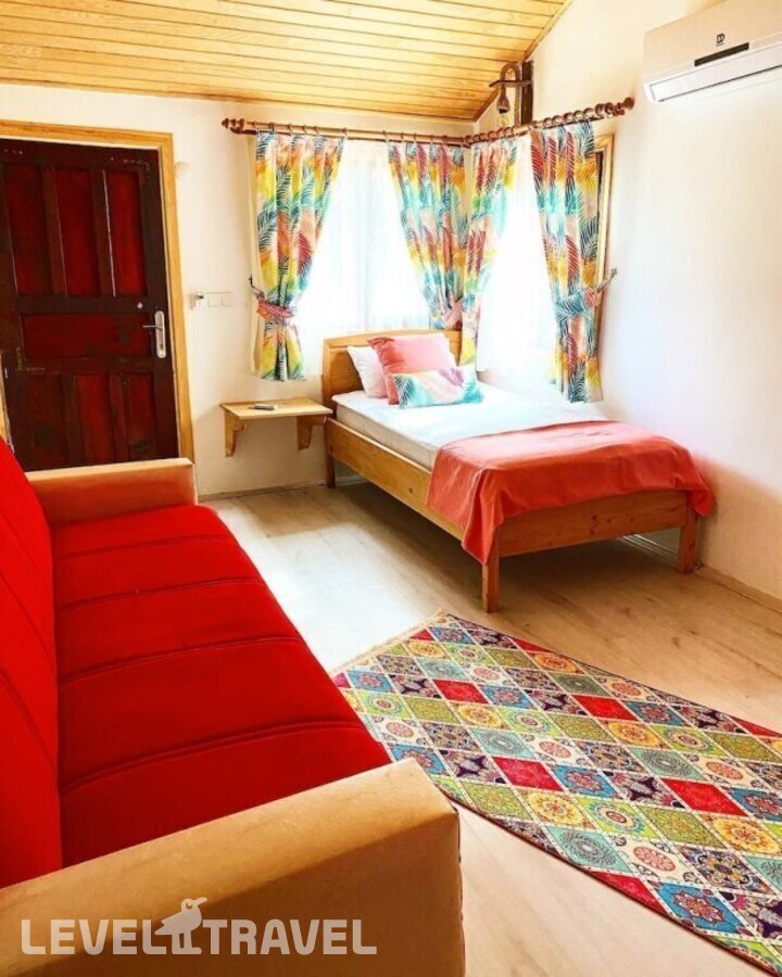 фотографии номера Семейный номер отеля Kara Kedi Beach Bungalow в Турция(Чиралы) - фото №4