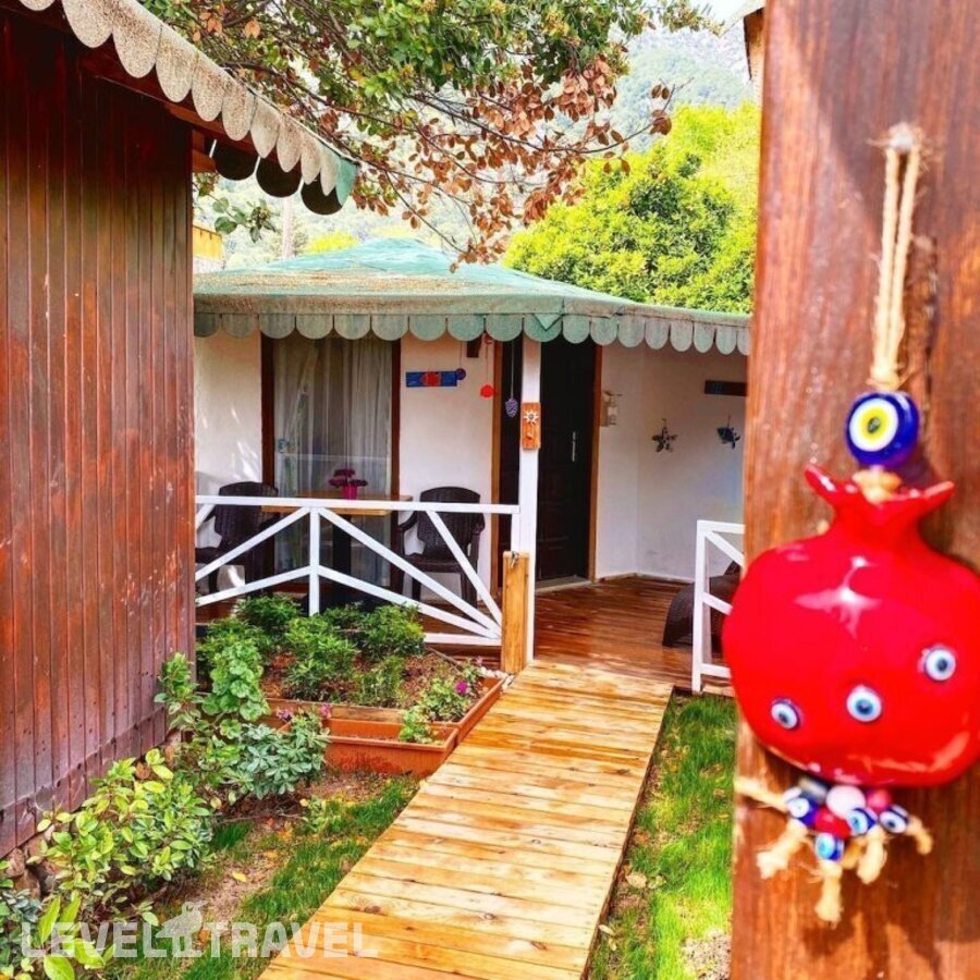 фотографии номера Делюкс отеля Kara Kedi Beach Bungalow в Турция(Чиралы) - фото №5