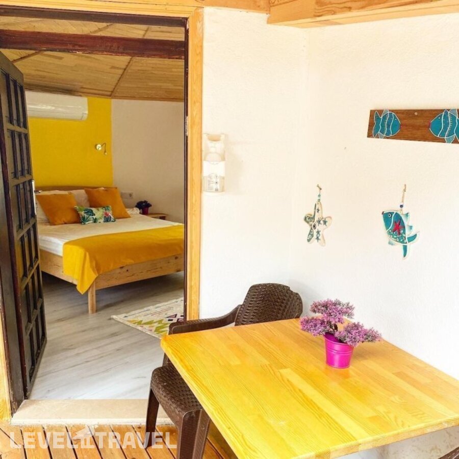 фотографии номера Делюкс отеля Kara Kedi Beach Bungalow в Турция(Чиралы) - фото №4