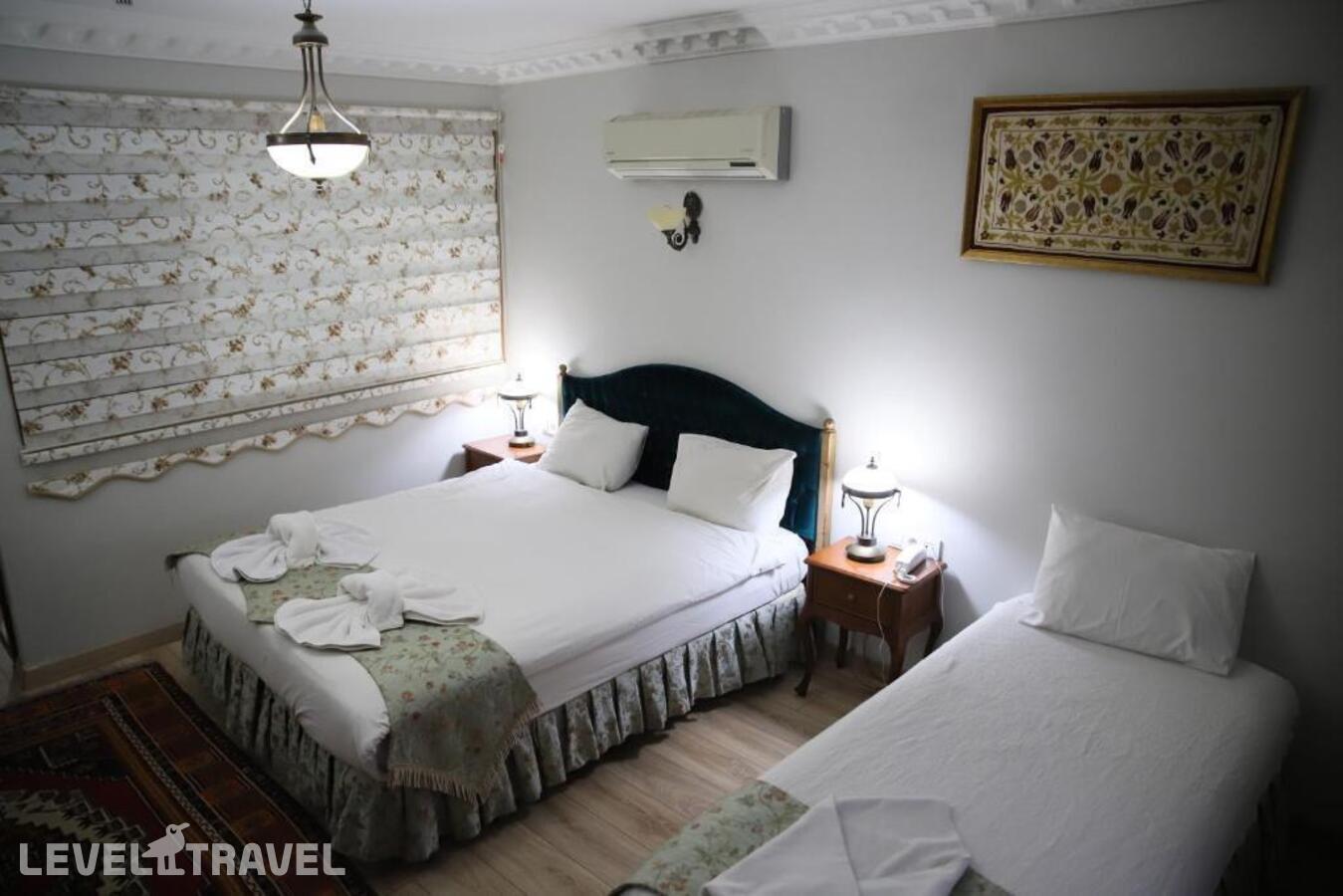 фотографии номера Трехместный номер отеля Basileus Hotel в Турция(Фатих) - фото №2