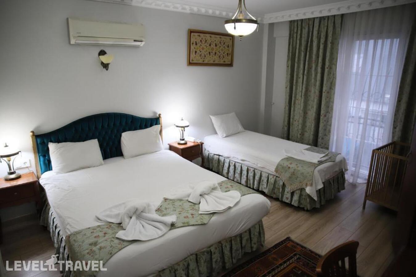 фотографии номера Трехместный номер отеля Basileus Hotel в Турция(Фатих) - фото №3