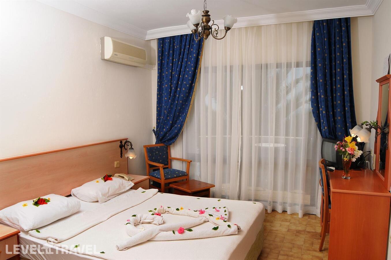 фотографии номера Стандартный номер отеля Dogan Paradise Beach Resort в Турция(Оздере) - фото №1