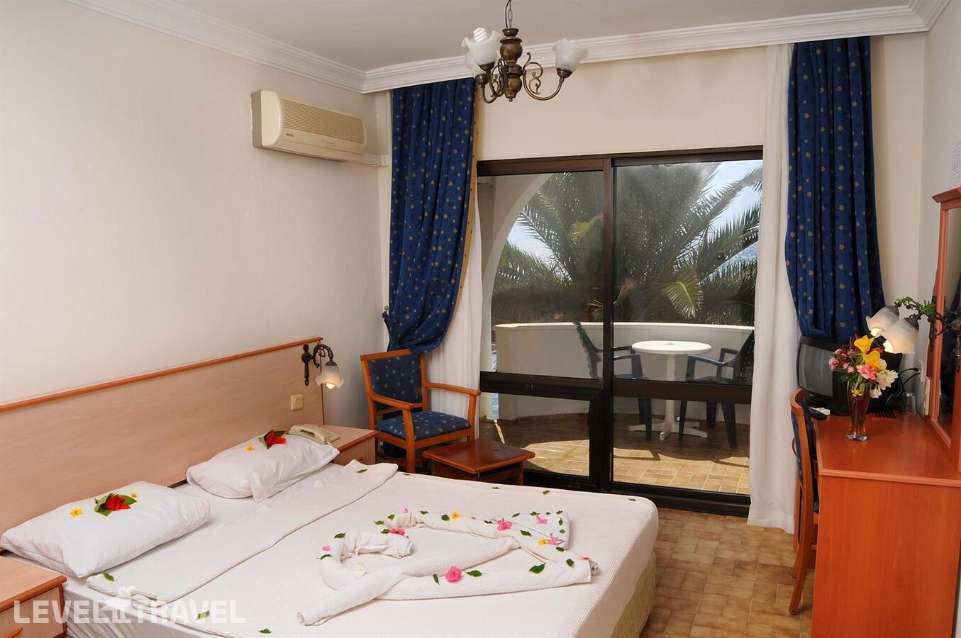фотографии номера Стандартный номер отеля Dogan Paradise Beach Resort в Турция(Оздере) - фото №2