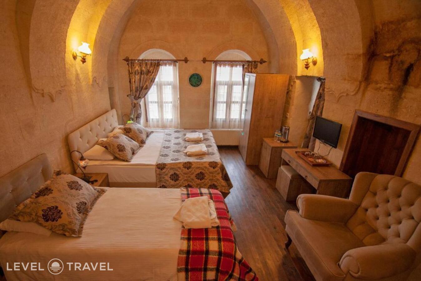 фотографии номера Трехместный делюкс отеля Diamond of Cappadocia в Турция(Гёреме) - фото №6