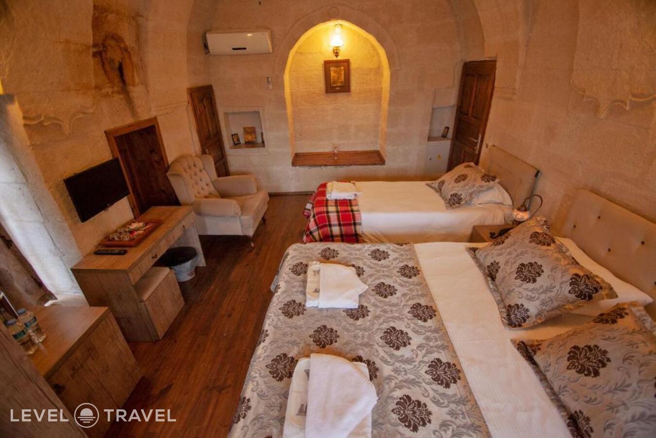 фотографии номера Трехместный делюкс отеля Diamond of Cappadocia в Турция(Гёреме) - фото №5