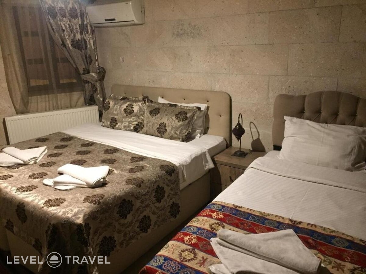 фотографии номера Четырехместный номер отеля Diamond of Cappadocia в Турция(Гёреме) - фото №1