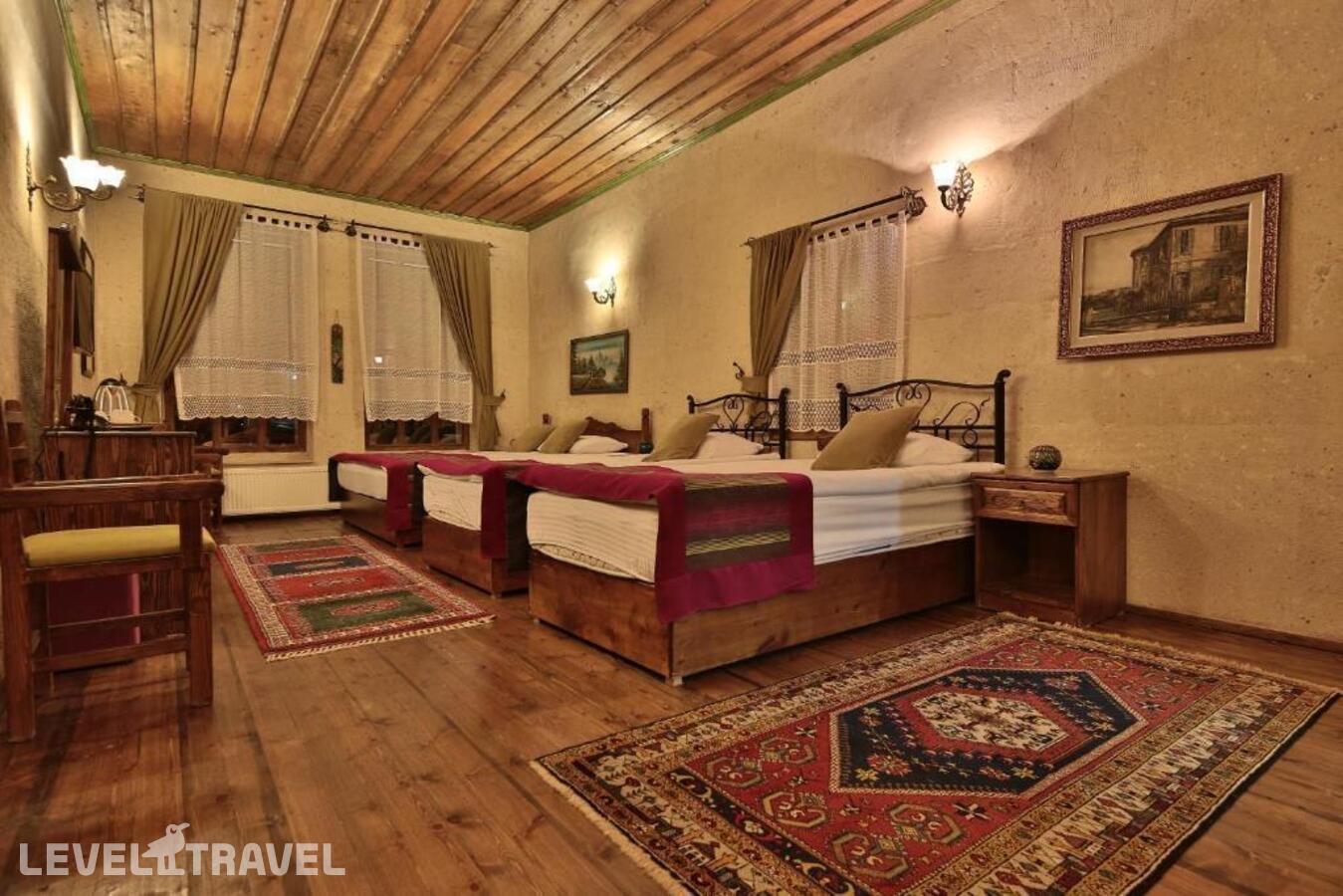 фотографии номера Семейный номер отеля Elif Stone House в Турция(Ургюп) - фото №1
