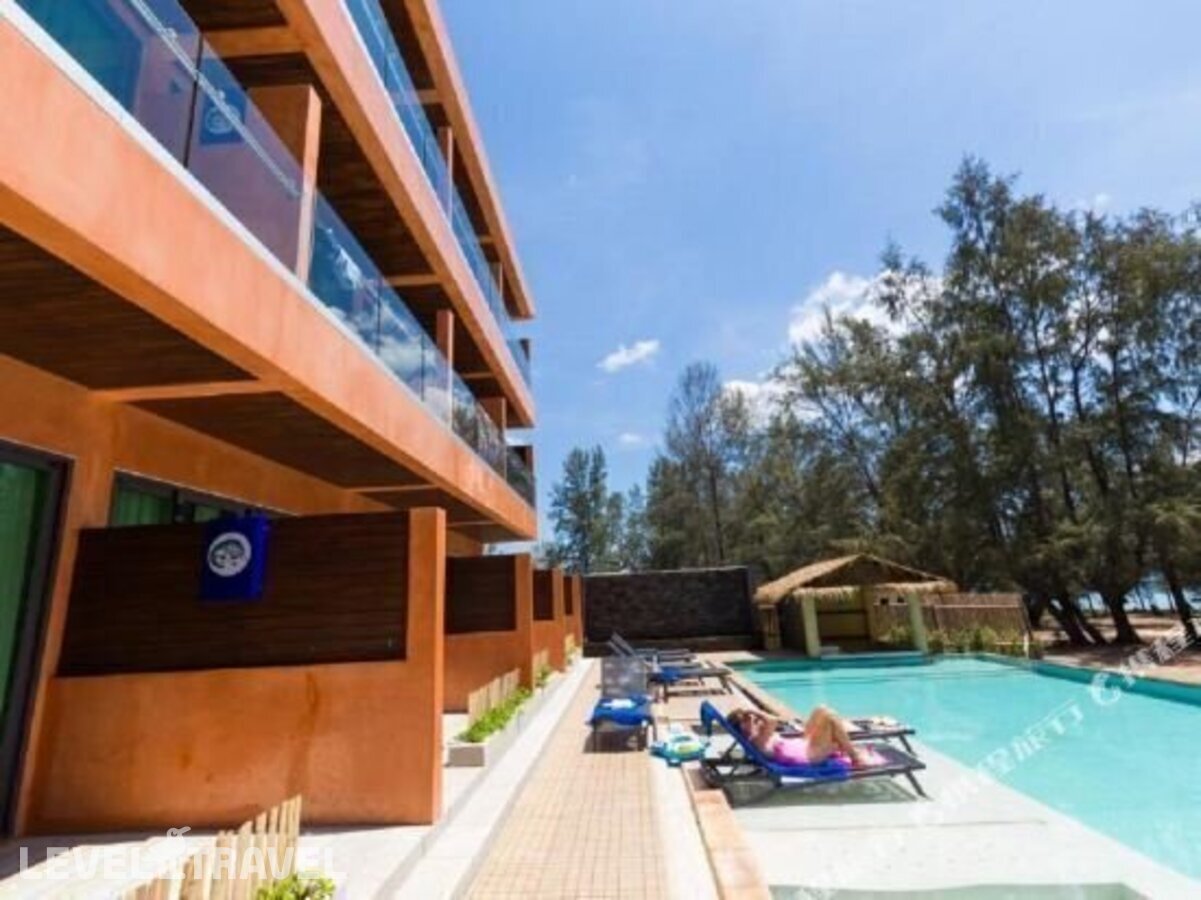 фотографии номера Делюкс с видом на море отеля Coriacea Boutique Resort в Таиланд(Май Као Бич) - фото №12