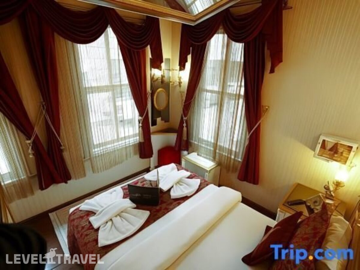 фотографии номера Трехместный номер отеля Sultan Tughra Hotel в Турция(Фатих) - фото №8