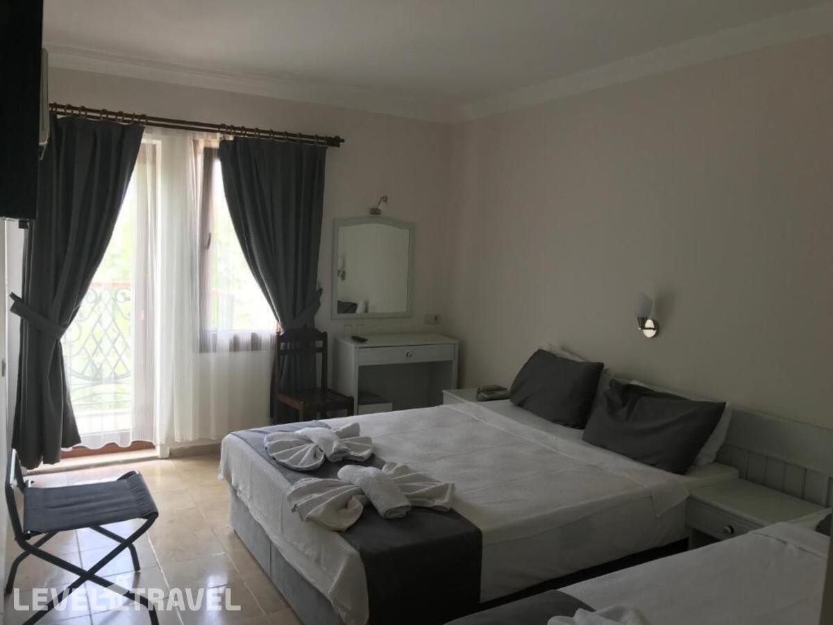 фотографии номера Трехместный номер отеля Kilim Apart Hotel в Турция(Фетхие) - фото №3