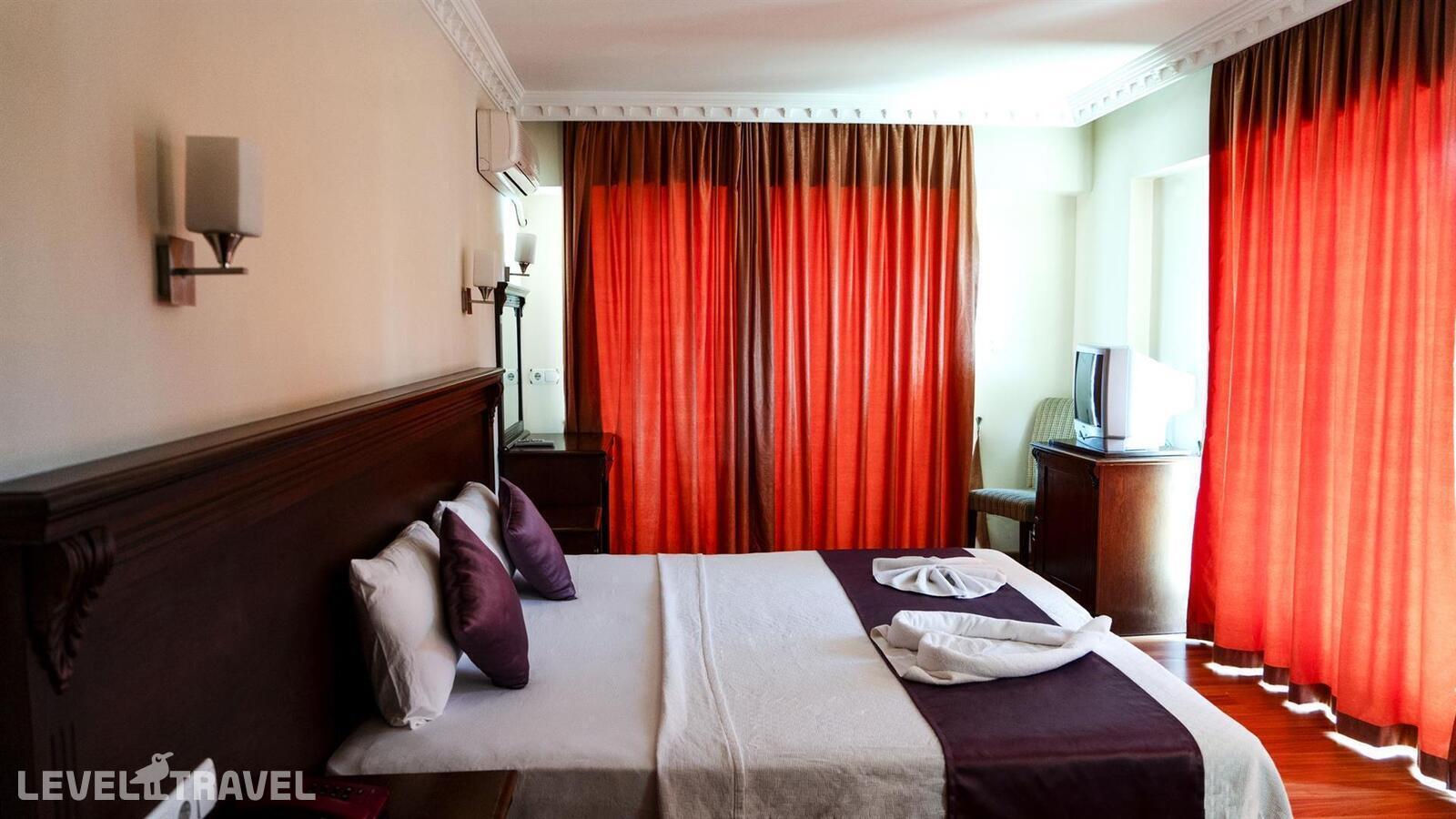 фотографии номера Стандартный номер отеля Cihanturk Hotel в Турция(Мармарис - центр) - фото №12