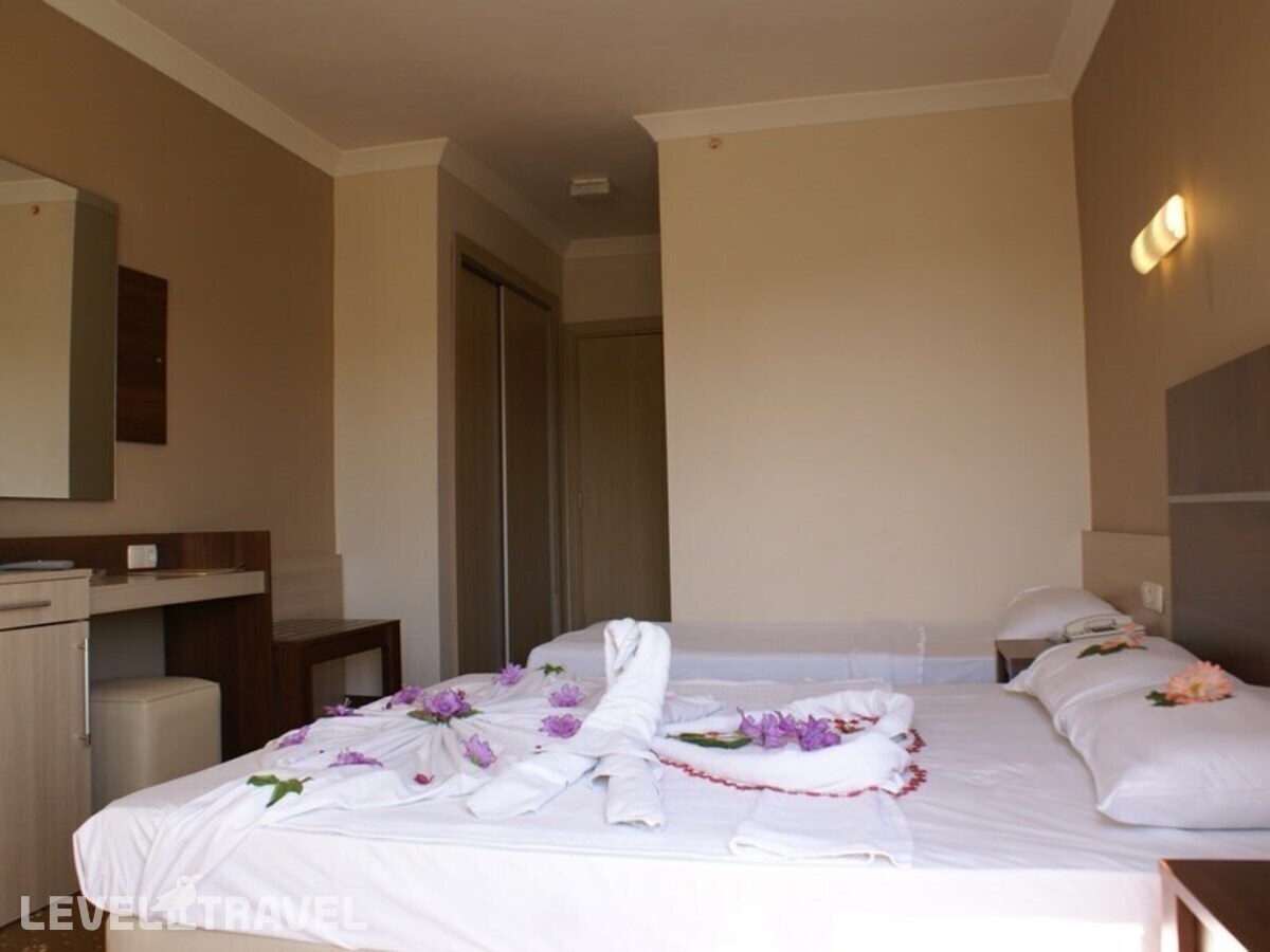 фотографии номера Стандартный номер отеля Magic Sun Hotel в Турция(Бельдиби) - фото №1