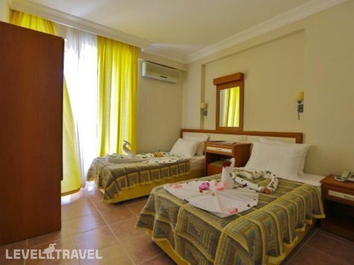 фотографии номера Семейный номер отеля Club Big Blue Suite Hotel в Турция(Аланья - центр) - фото №9