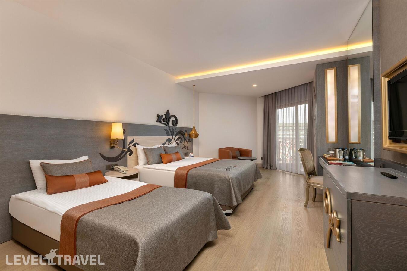 фотографии номера Стандартный с видом на окрестности отеля Kirman Belazur Resort & Spa в Турция(Богазкент) - фото №2