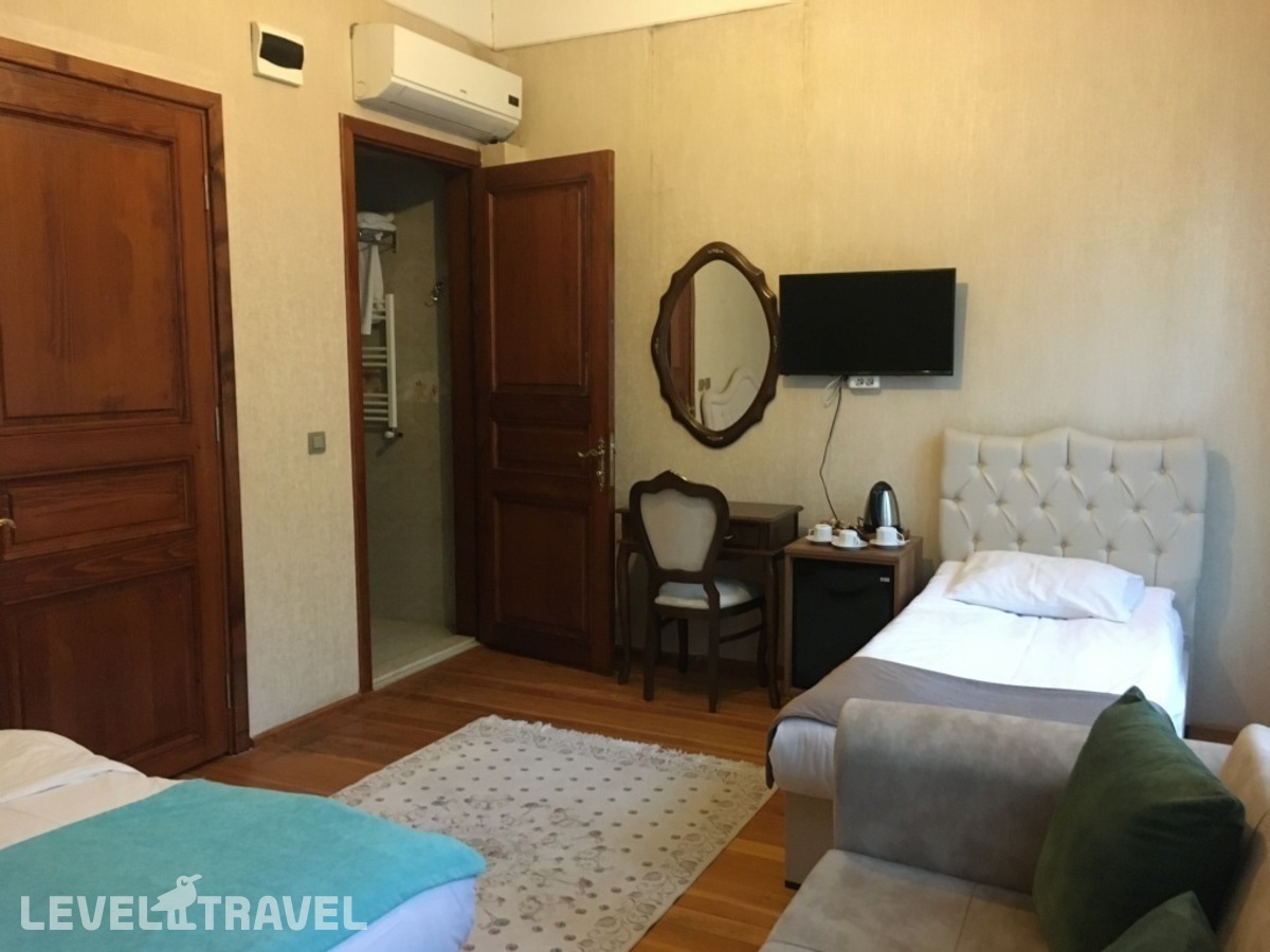 фотографии номера Трехместный номер отеля Nuray Hotel в Турция(Фатих) - фото №4