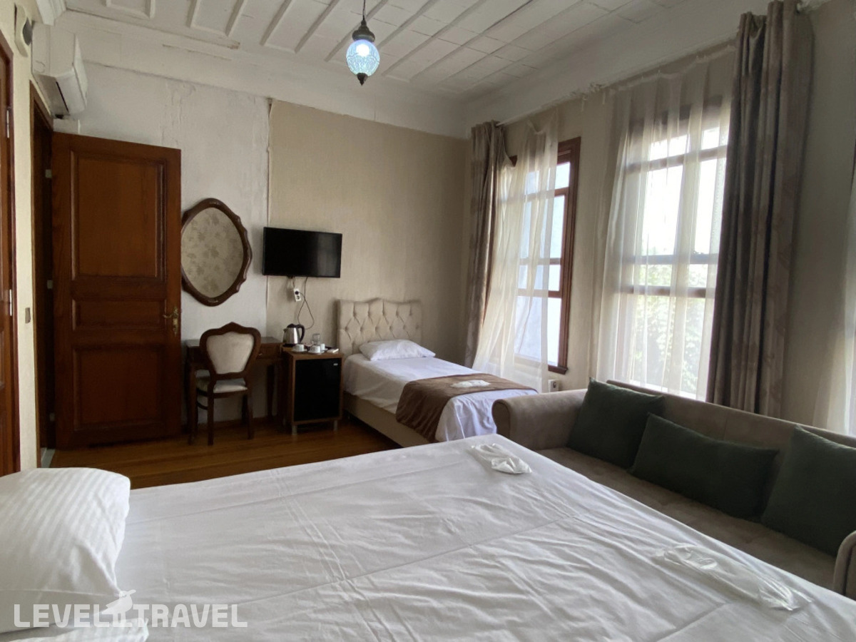 фотографии номера Трехместный номер отеля Nuray Hotel в Турция(Фатих) - фото №1