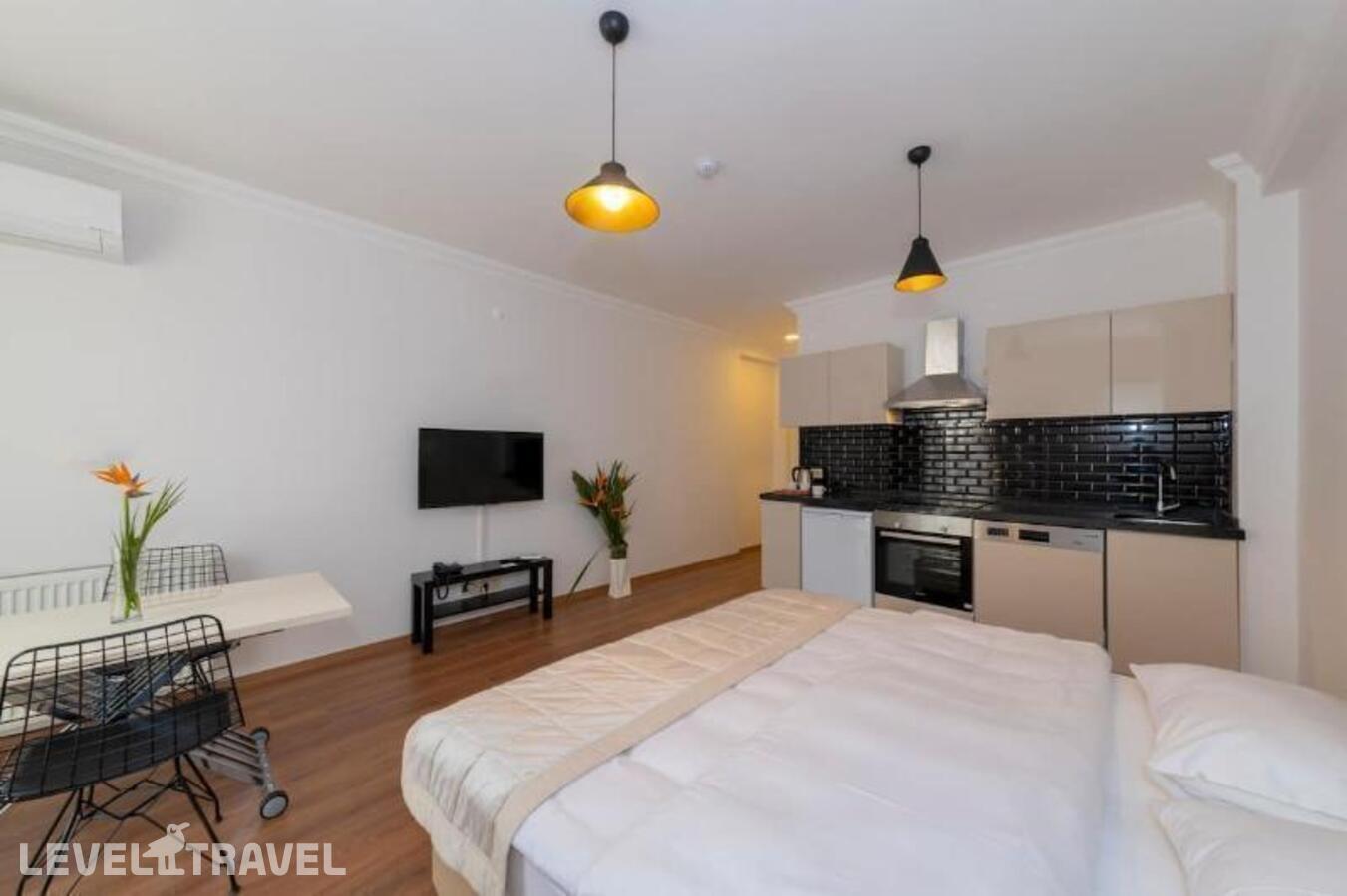 фотографии номера Улучшенный номер отеля Апарт-Отель Joy Suites в Турция(Шишли) - фото №4