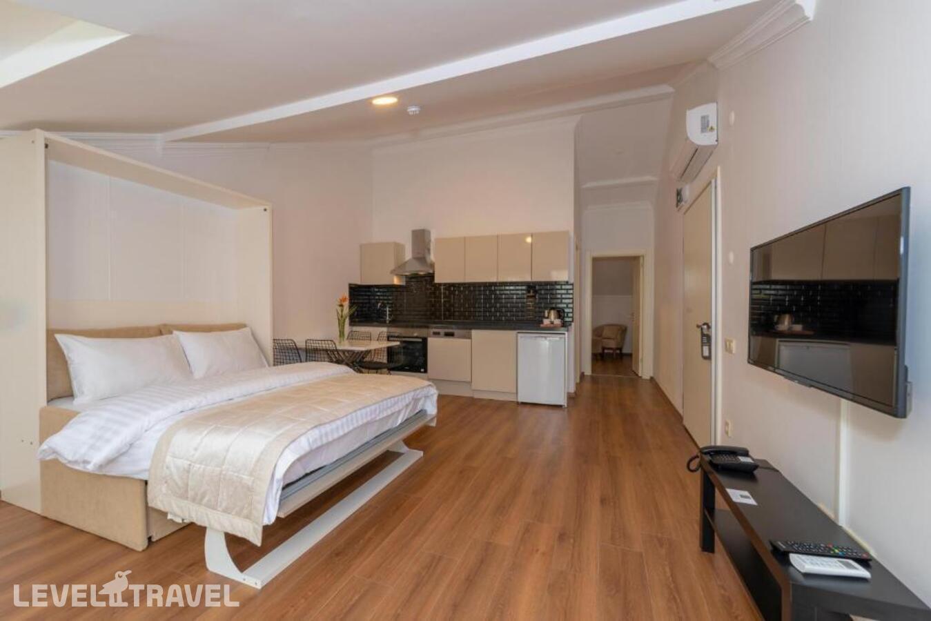 фотографии номера Семейный люкс отеля Апарт-Отель Joy Suites в Турция(Шишли) - фото №6
