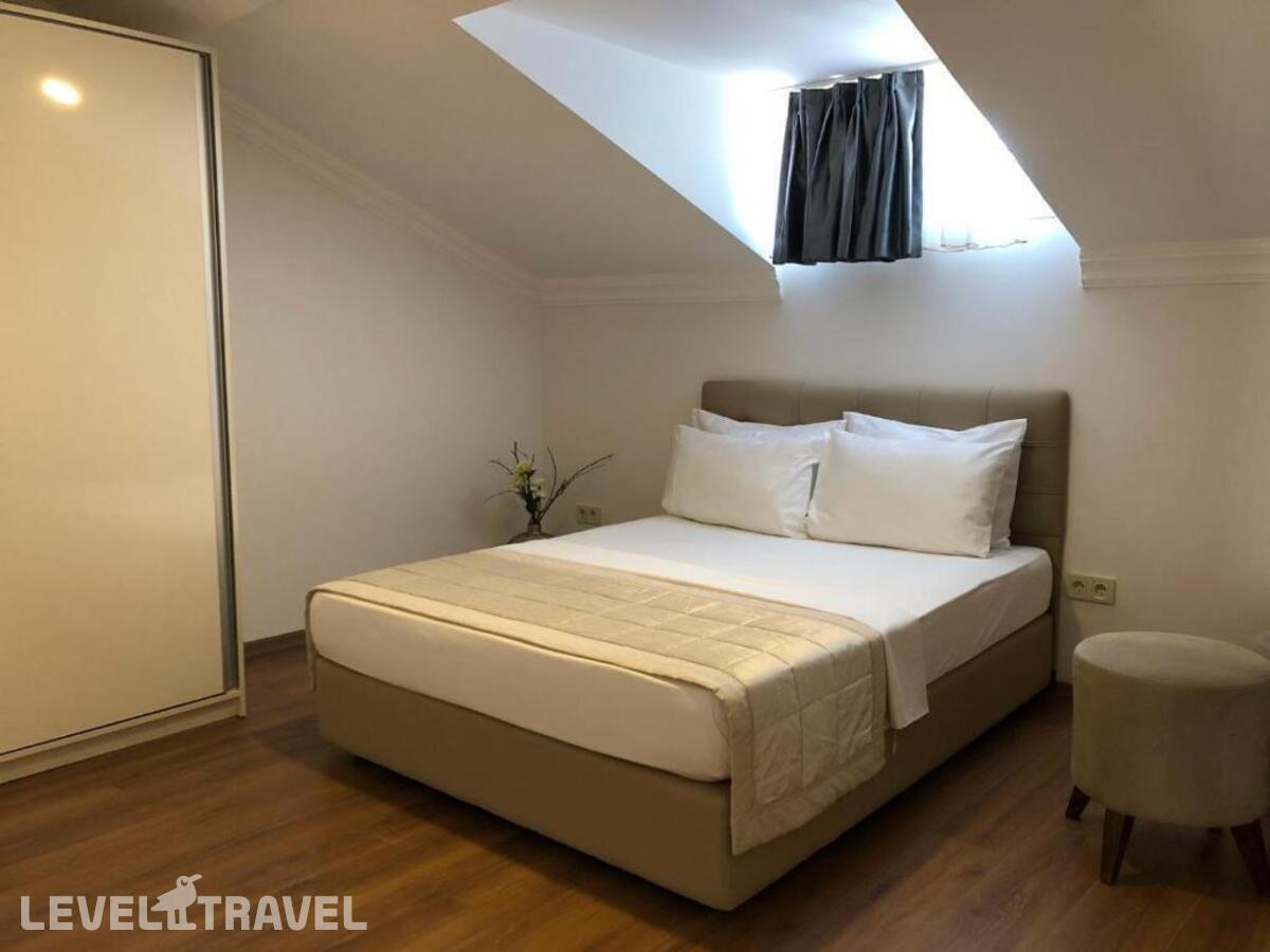 фотографии номера Семейный люкс отеля Апарт-Отель Joy Suites в Турция(Шишли) - фото №3