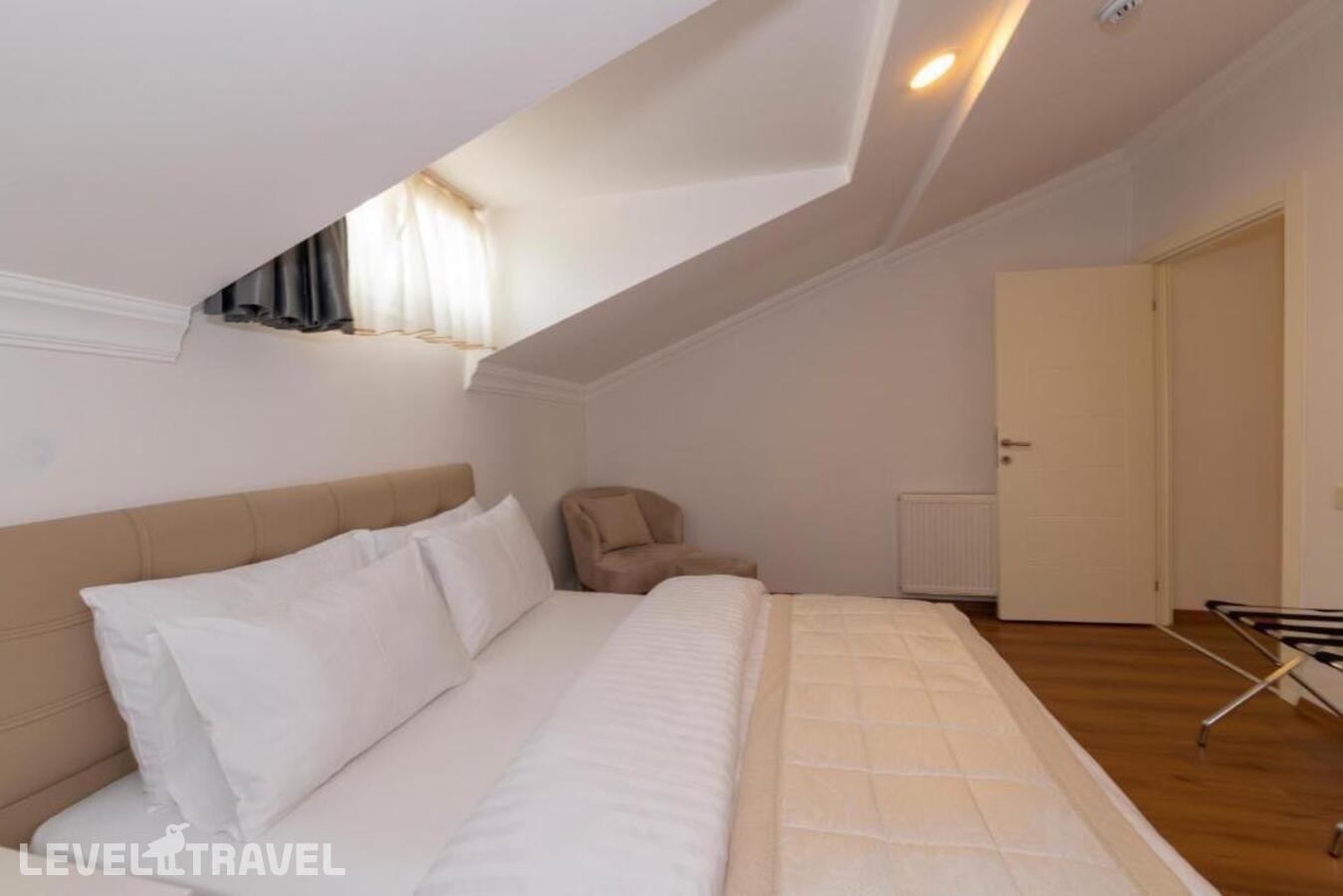 фотографии номера Семейный люкс отеля Апарт-Отель Joy Suites в Турция(Шишли) - фото №4