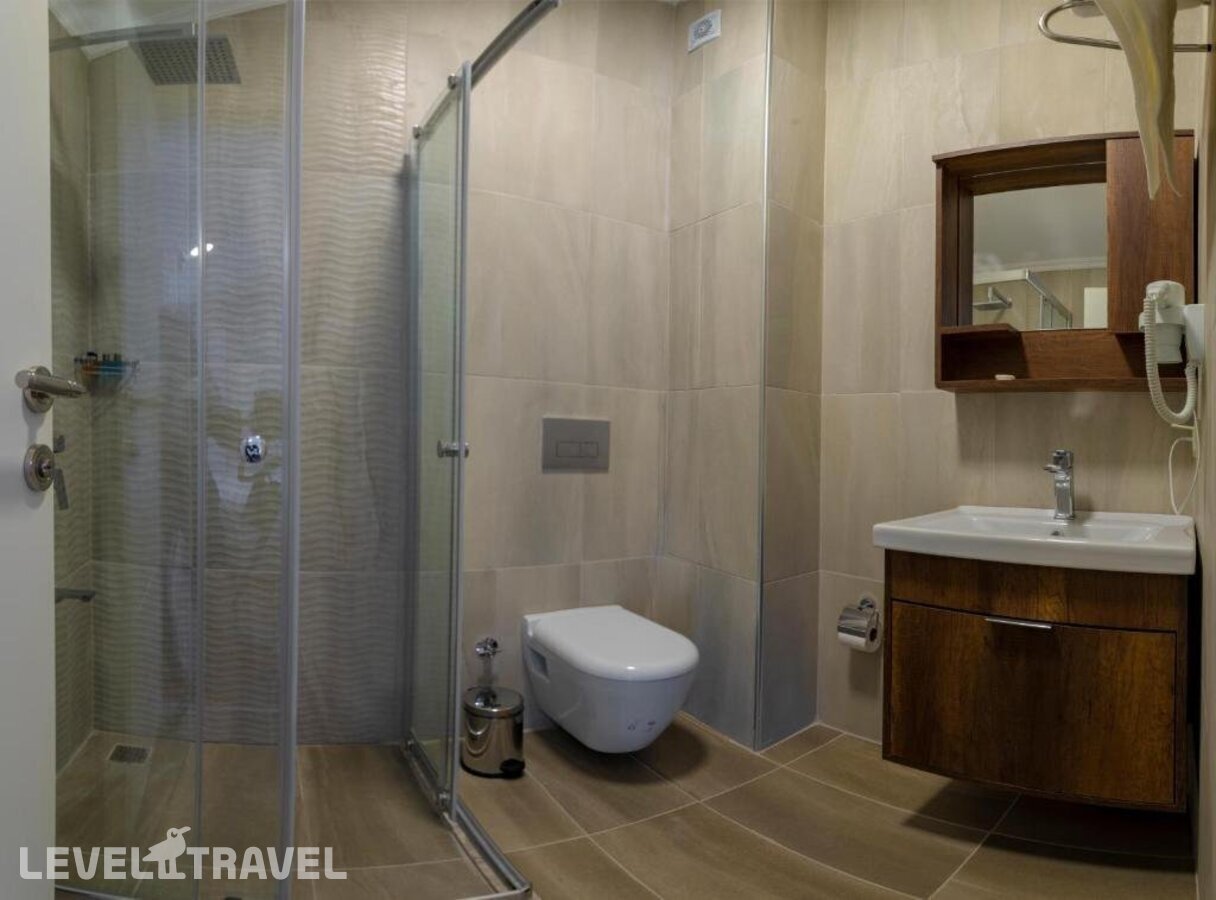 фотографии номера Семейный номер отеля Апарт-Отель Joy Suites в Турция(Шишли) - фото №2