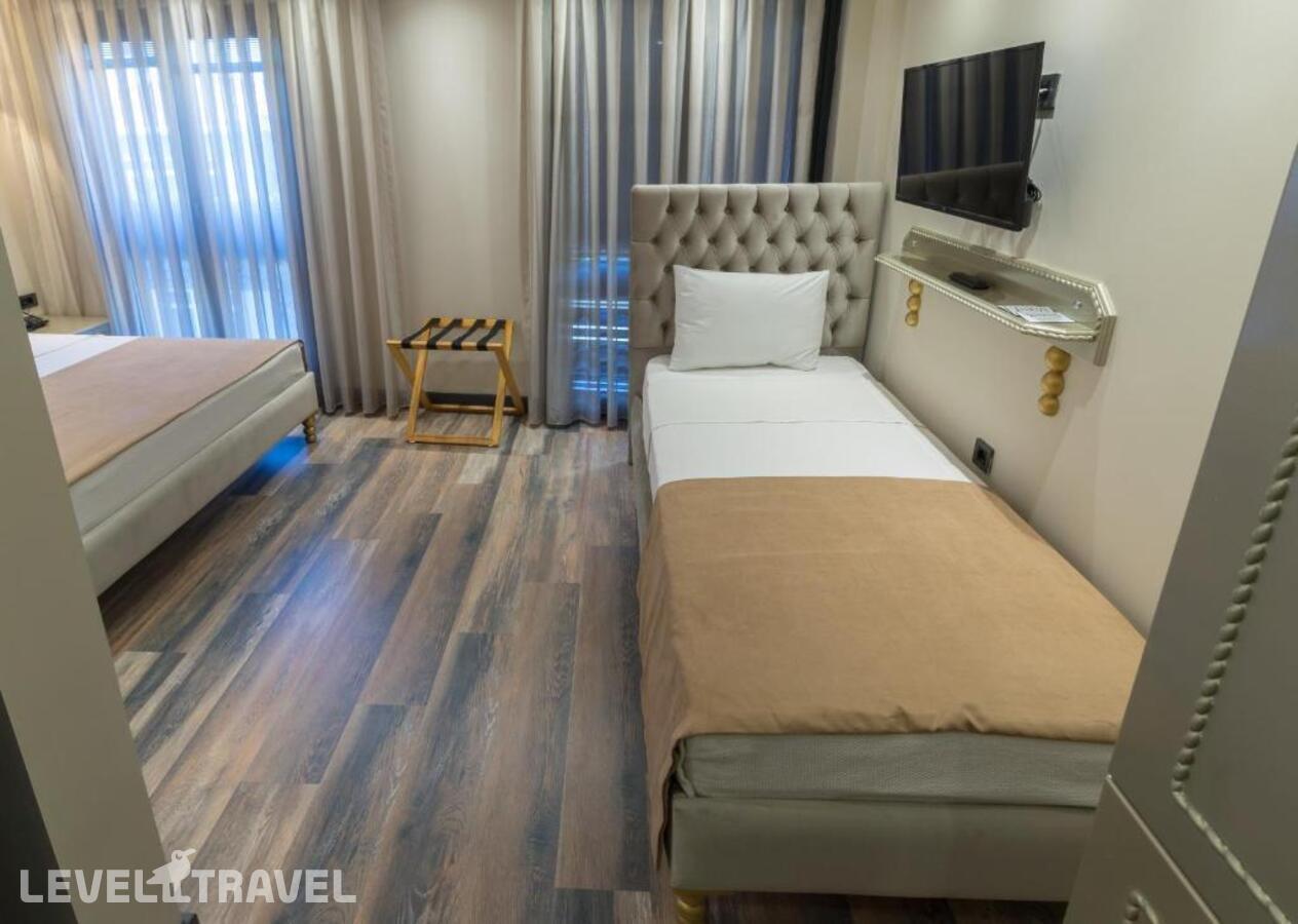 фотографии номера Трехместный номер отеля Hotel Mardia в Турция(Фатих) - фото №2