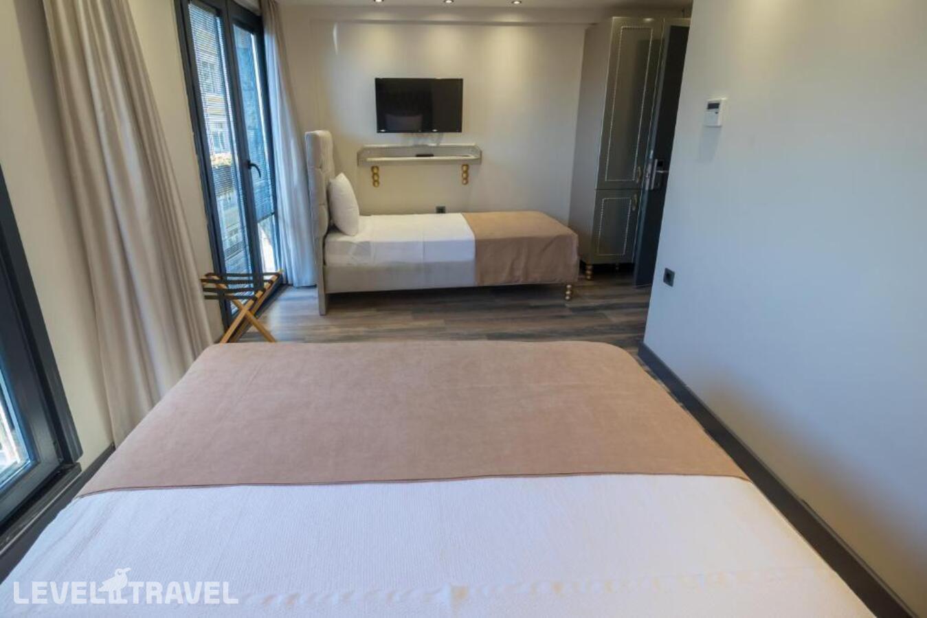фотографии номера Трехместный номер отеля Hotel Mardia в Турция(Фатих) - фото №3