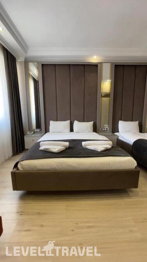 фотографии номера Трехместный номер отеля Reyyan Hotel в Турция(Фатих) - фото №1