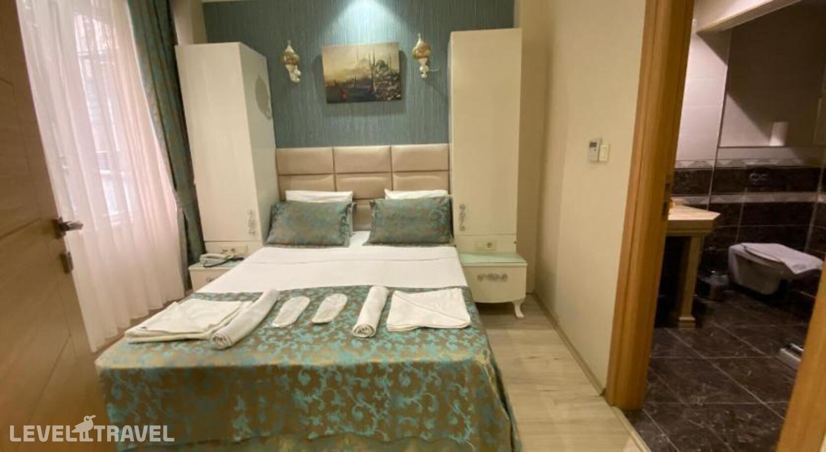 фотографии номера Стандартный номер отеля Reyyan Hotel в Турция(Фатих) - фото №1